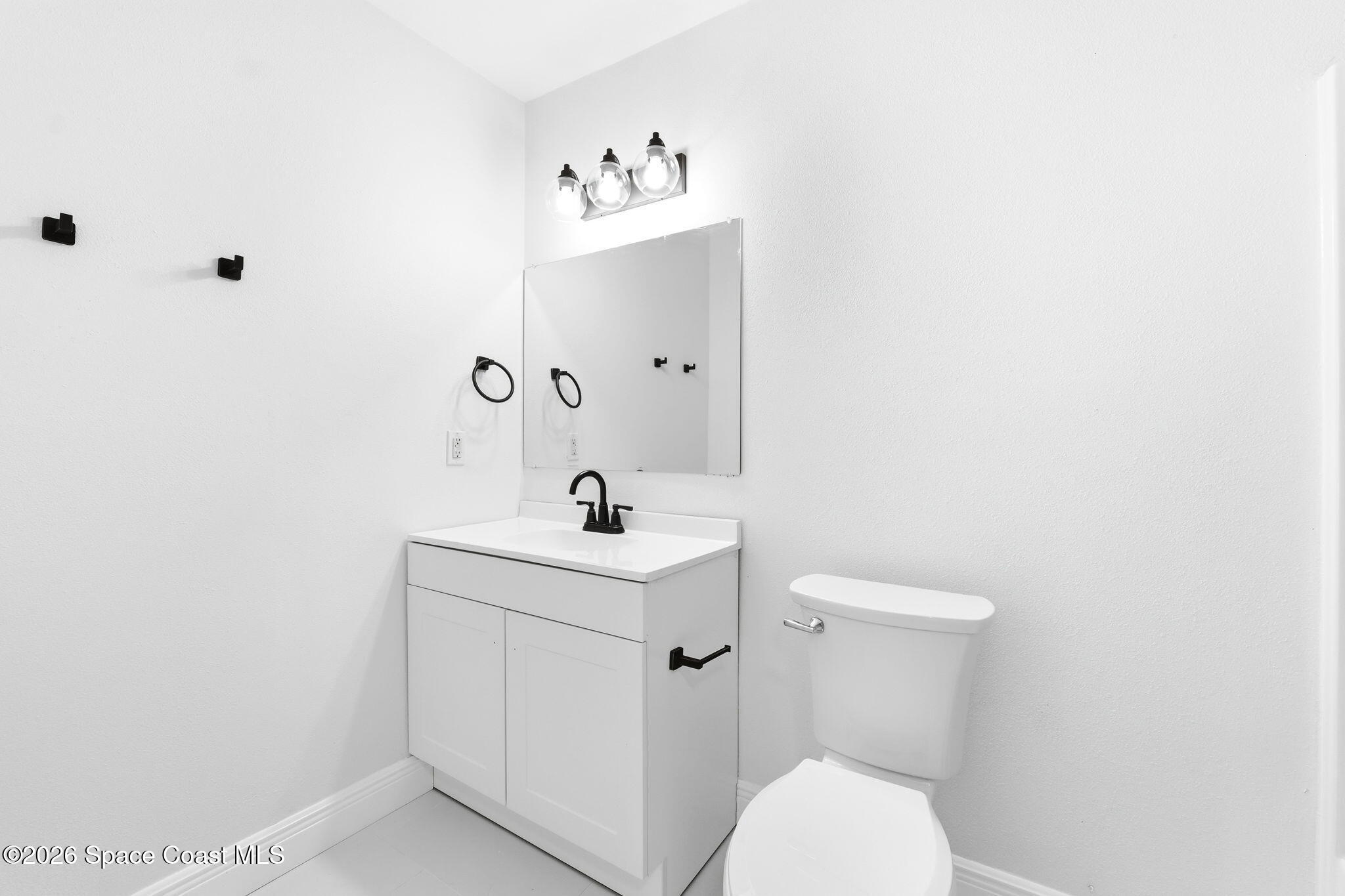 255 Abalone Road Northwest Palm Bay, FL 32907 - Photo 10 of 10 Guest Bathroom 1