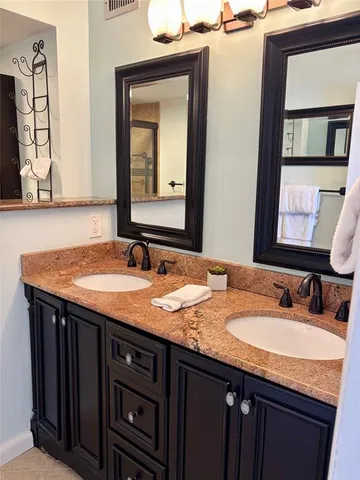 a room with furniture and wooden floor