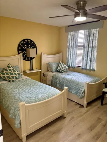 a bedroom with a bed and dresser