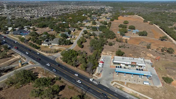an aerial view of residential house with outdoor space