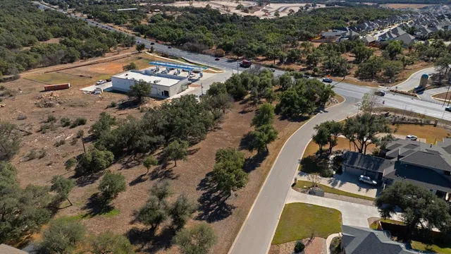 an aerial view of residential house with outdoor space