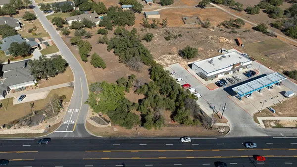 an aerial view of a multi story residential apartment building