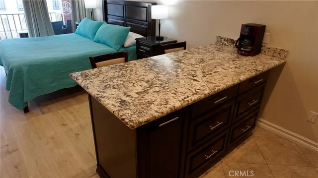 a kitchen with a sink and a stove