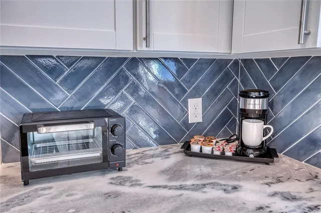 a view of a backyard with plants