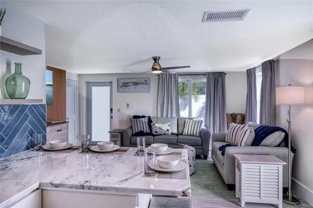 a kitchen with a table and chairs