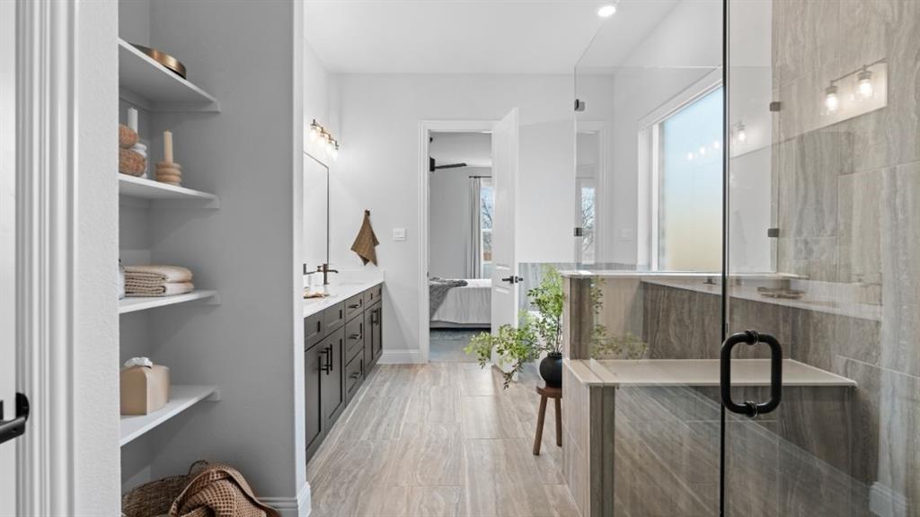 1633 Keneipp Road Carrollton, TX 75006 - Photo 15 of 18 a view of entryway and hall with a bathtub