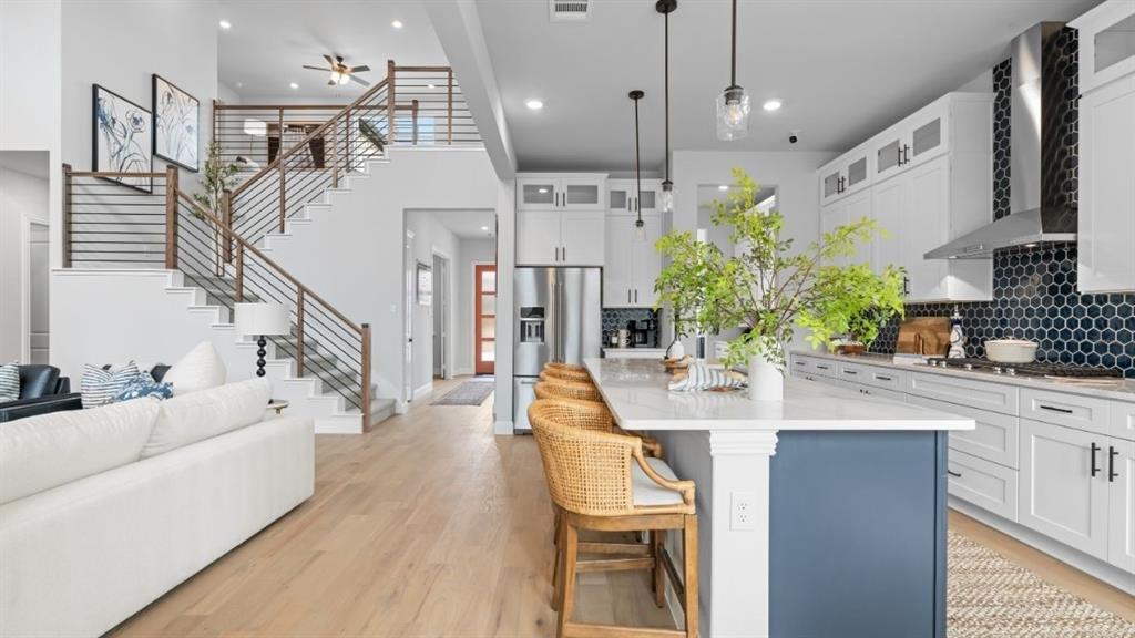 1633 Keneipp Road Carrollton, TX 75006 - Photo 4 of 18 a large white kitchen with lots of counter space a sink and appliances