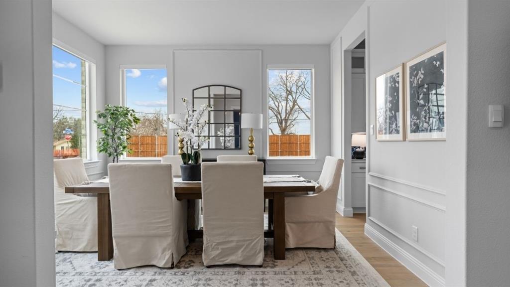 1633 Keneipp Road Carrollton, TX 75006 - Photo 8 of 18 a view of a dining room with furniture window and outside view