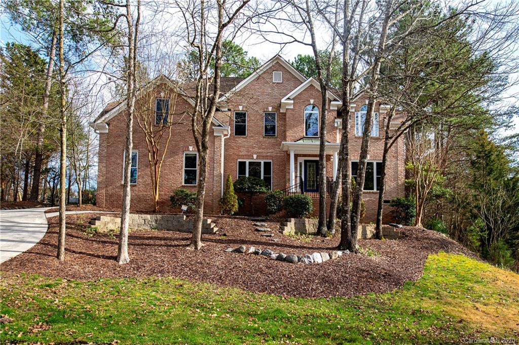 11135 Scullers Run Tega Cay, SC 29708 - Photo 1 of 33 a view of a house with a yard and large tree