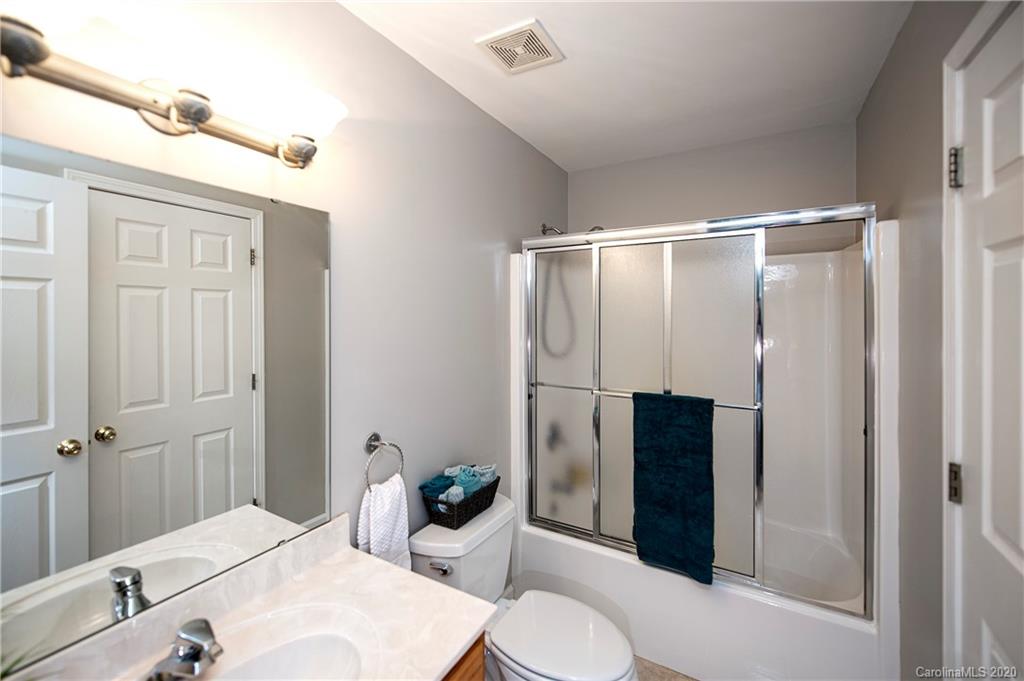 11135 Scullers Run Tega Cay, SC 29708 - Photo 19 of 33 a bathroom with a sink toilet and shower