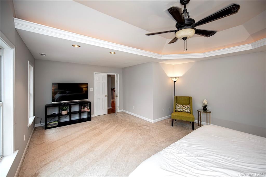 11135 Scullers Run Tega Cay, SC 29708 - Photo 23 of 33 a bedroom with a bed and a television