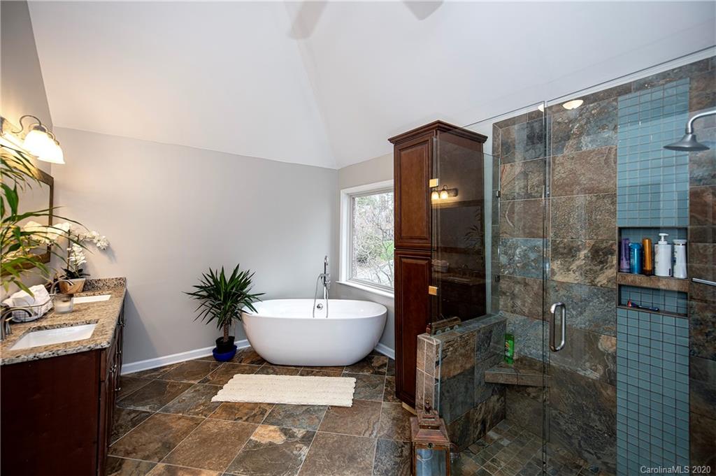 11135 Scullers Run Tega Cay, SC 29708 - Photo 24 of 33 a spacious bathroom with a bathtub and shower