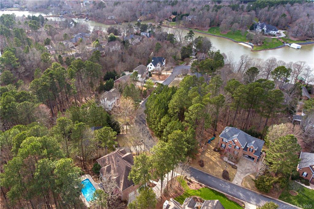 11135 Scullers Run Tega Cay, SC 29708 - Photo 33 of 33 an aerial view of lake residential house with swimming pool and green space
