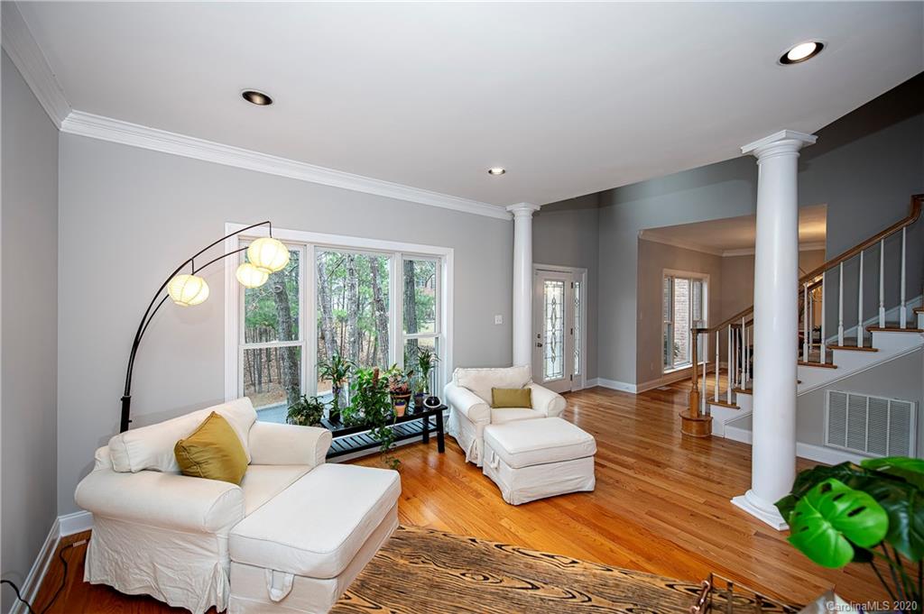 11135 Scullers Run Tega Cay, SC 29708 - Photo 5 of 33 a living room with furniture and a large window