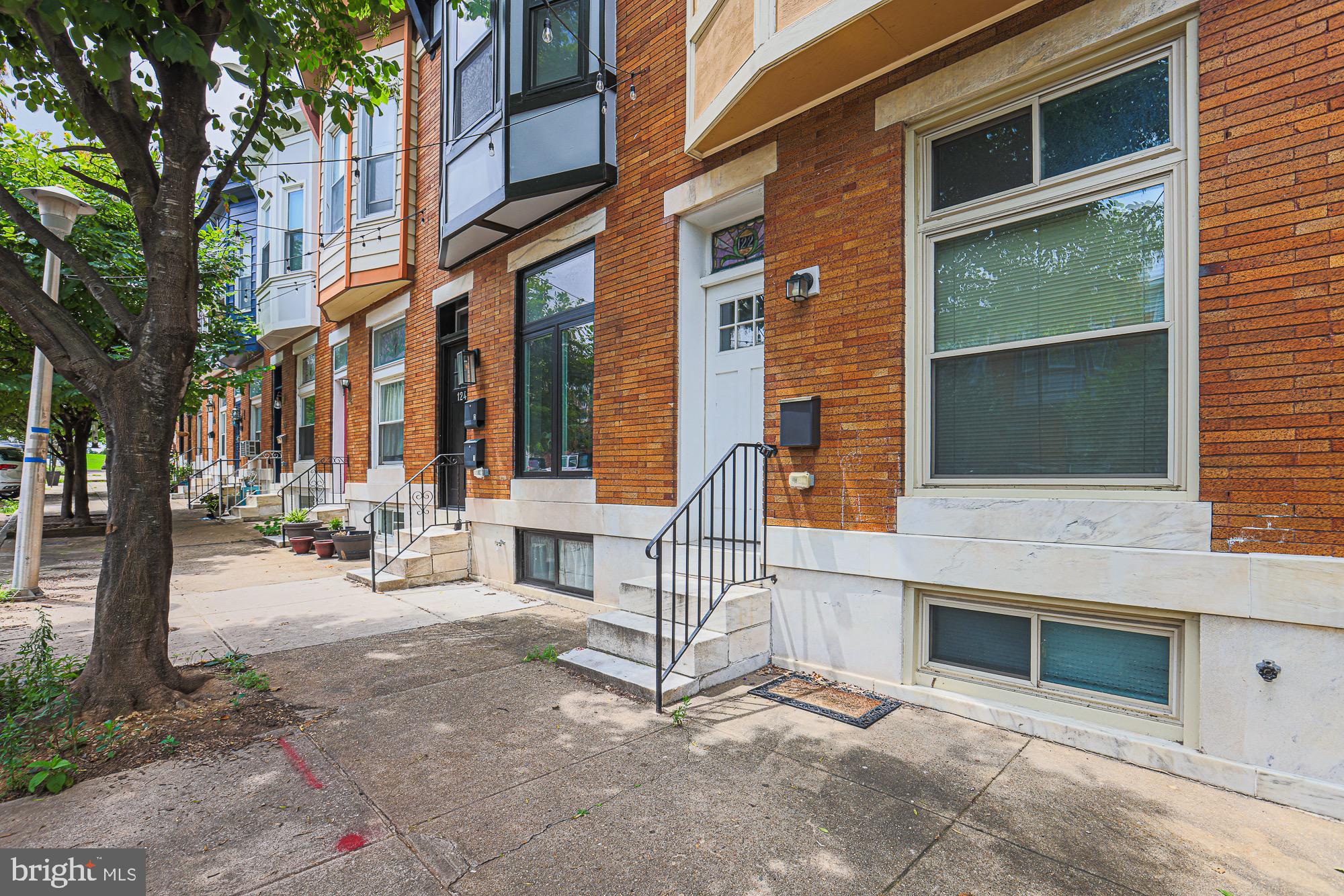 122 South Potomac Street Baltimore, MD 21224 - Photo 1 of 31 a view of a building with sitting area