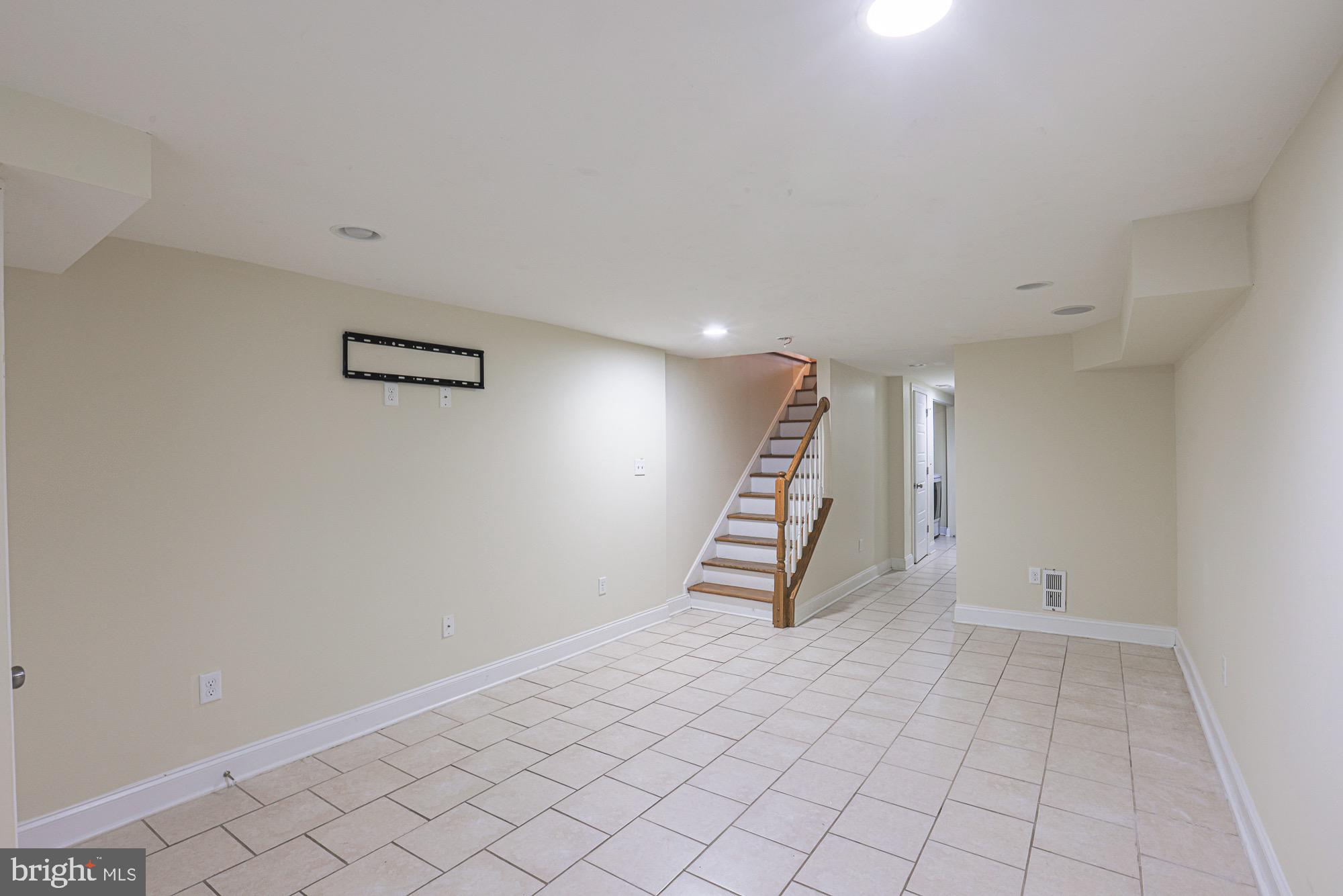 122 South Potomac Street Baltimore, MD 21224 - Photo 26 of 31 a view of an empty room with stairs