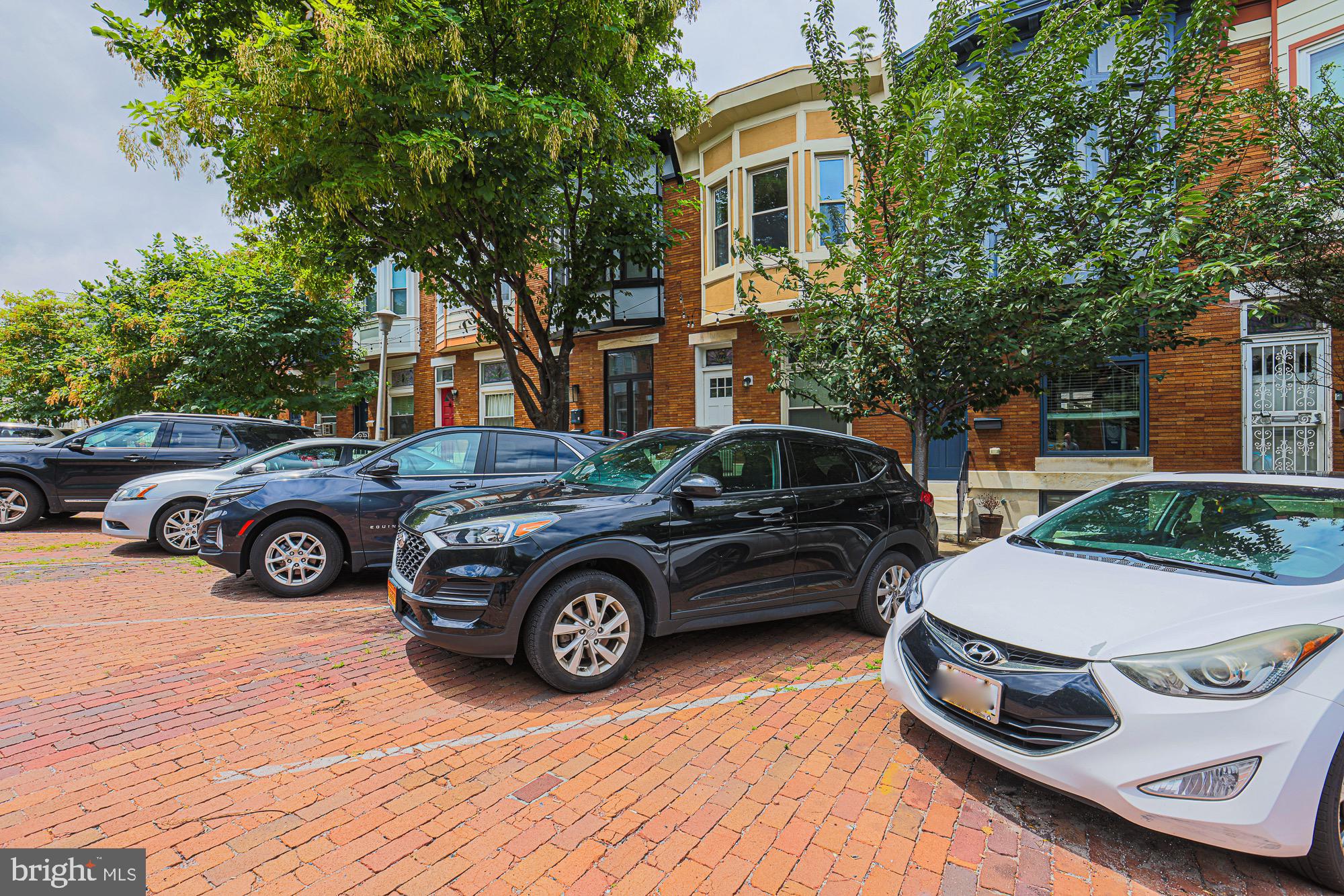 122 South Potomac Street Baltimore, MD 21224 - Photo 6 of 31 a view of a car parked in front of a house