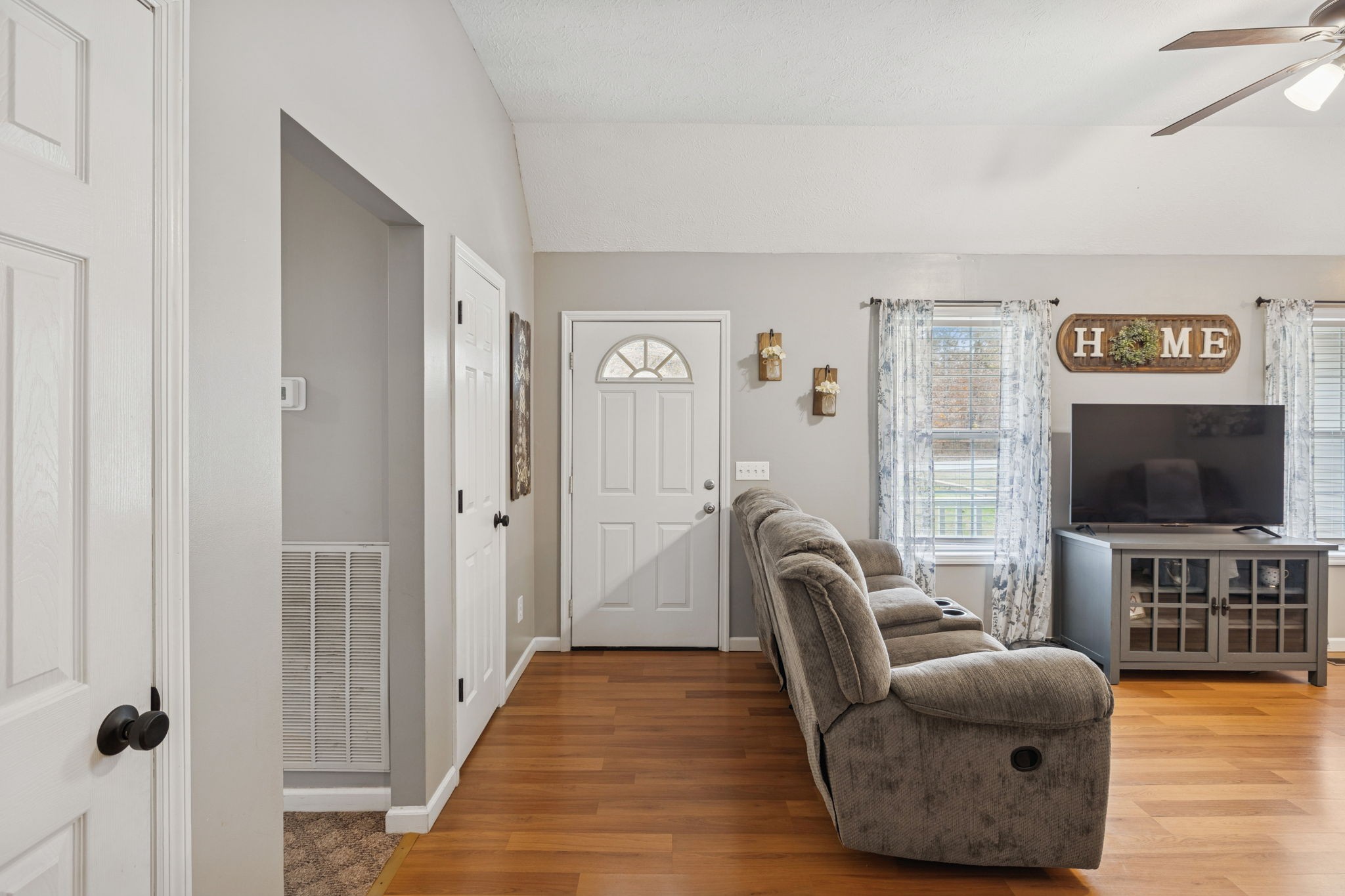 1904 Buffalo Road Hohenwald, TN 38462 - Photo 19 of 51 a living room with furniture and a flat screen tv