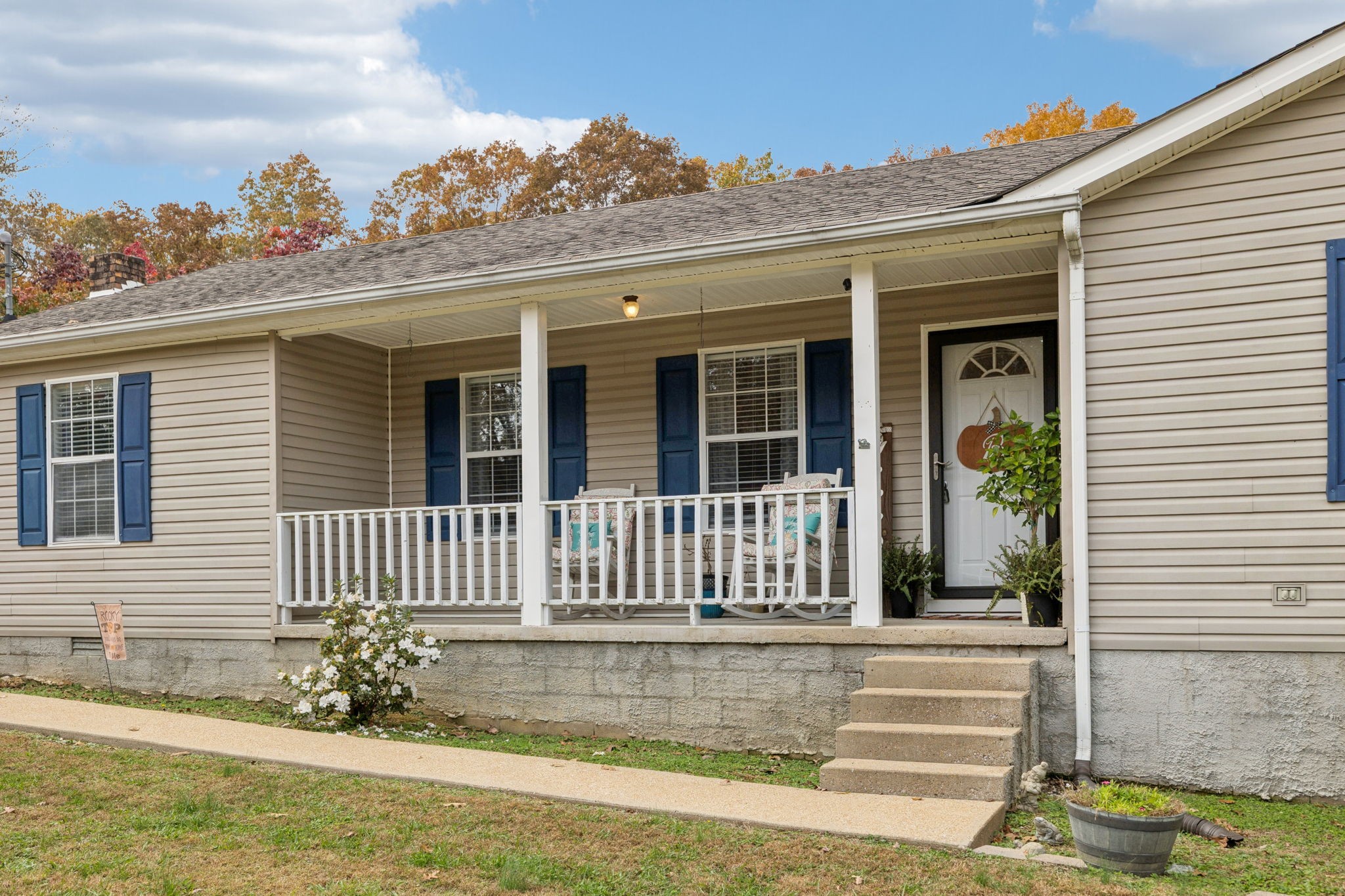 1904 Buffalo Road Hohenwald, TN 38462 - Photo 3 of 51 a view of a house with a small yard and wooden floor and fence