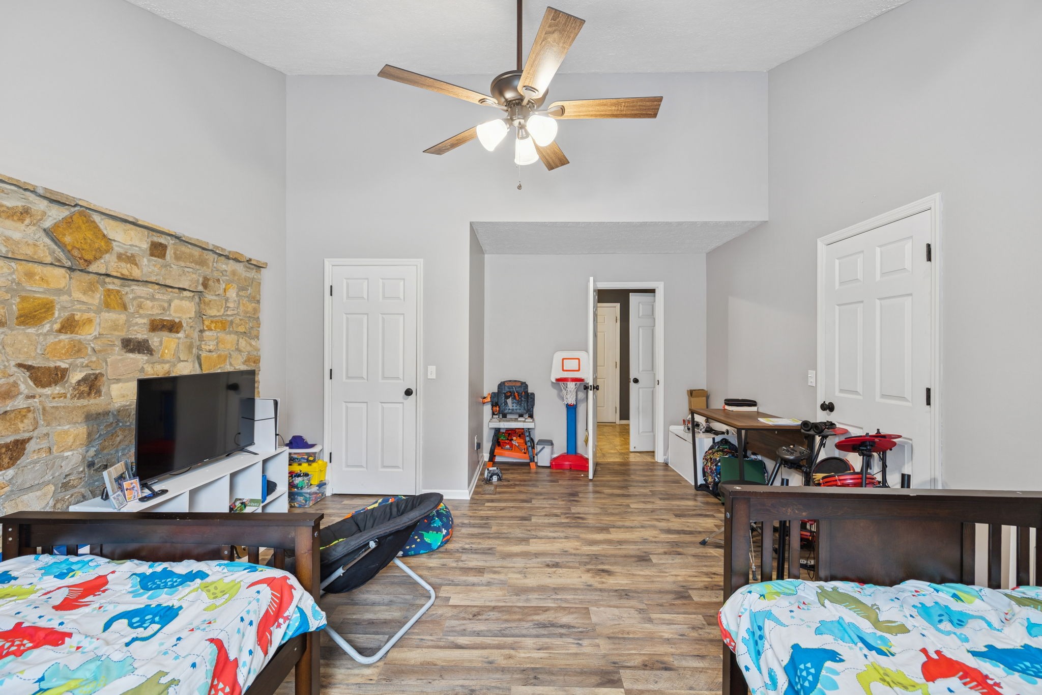 1904 Buffalo Road Hohenwald, TN 38462 - Photo 35 of 51 a bed room with furniture and a flat screen tv