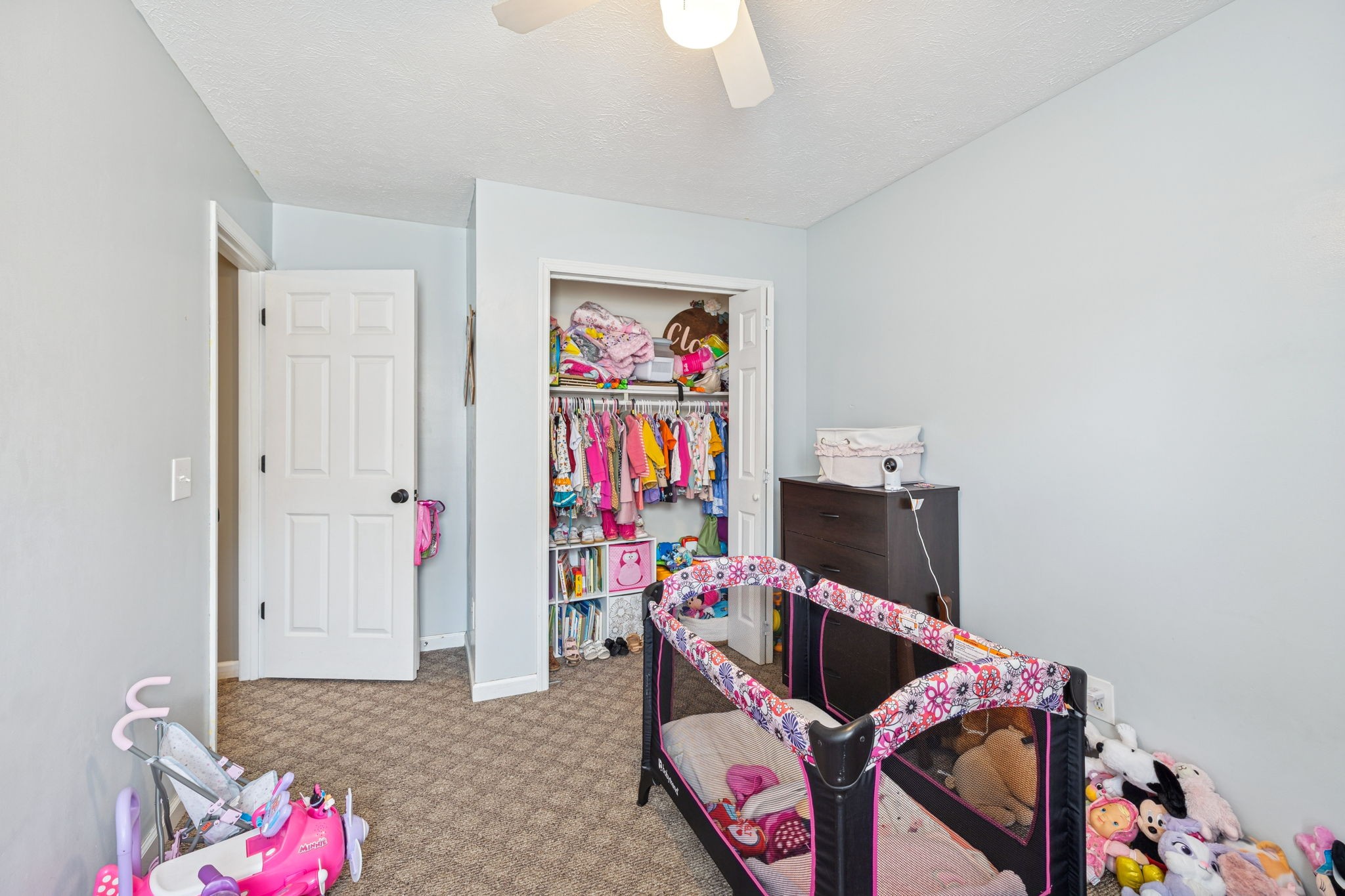 1904 Buffalo Road Hohenwald, TN 38462 - Photo 41 of 51 a living room with furniture and a book shelf