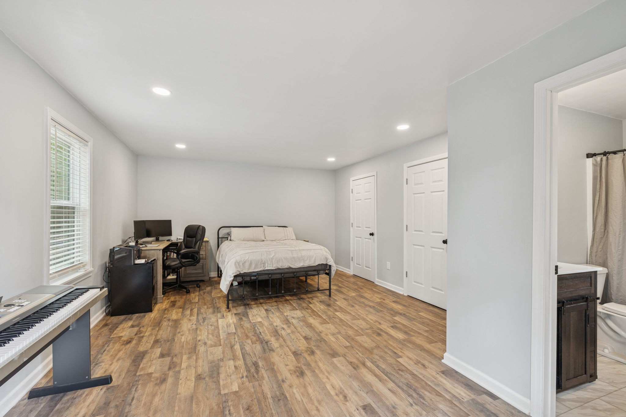 1904 Buffalo Road Hohenwald, TN 38462 - Photo 47 of 51 a living room with furniture and a wooden floor