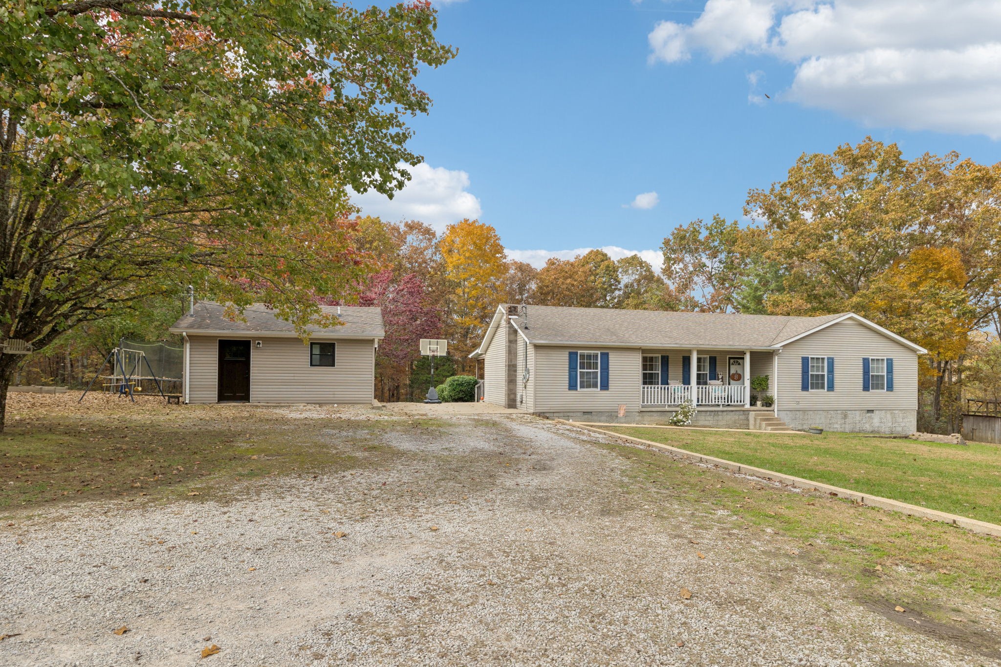 1904 Buffalo Road Hohenwald, TN 38462 - Photo 8 of 51 a front view of a house with a garden