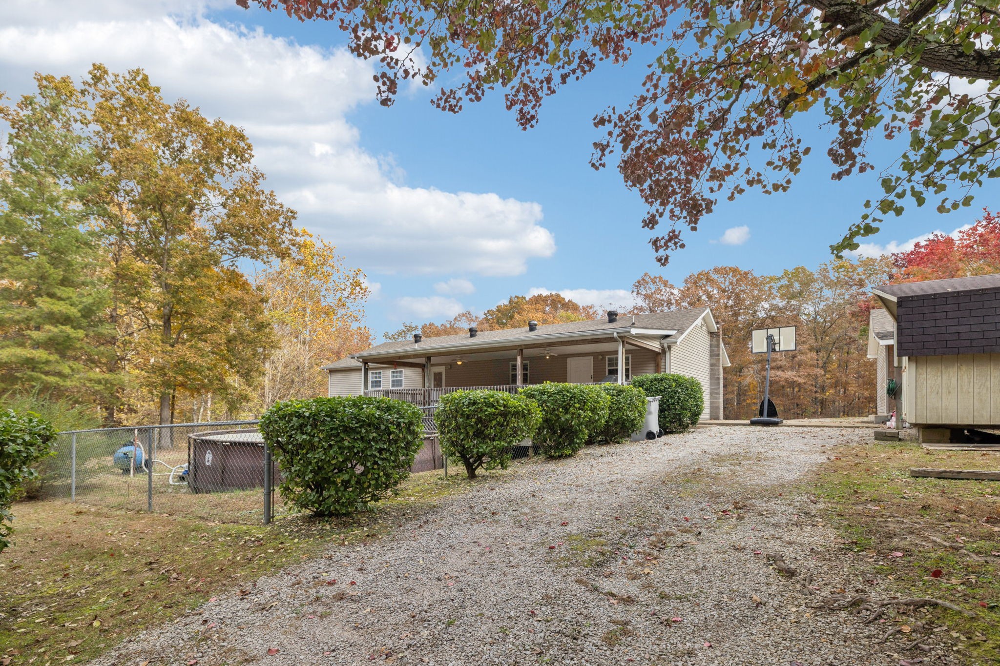 1904 Buffalo Road Hohenwald, TN 38462 - Photo 9 of 51 a view of a house with a tree in the background