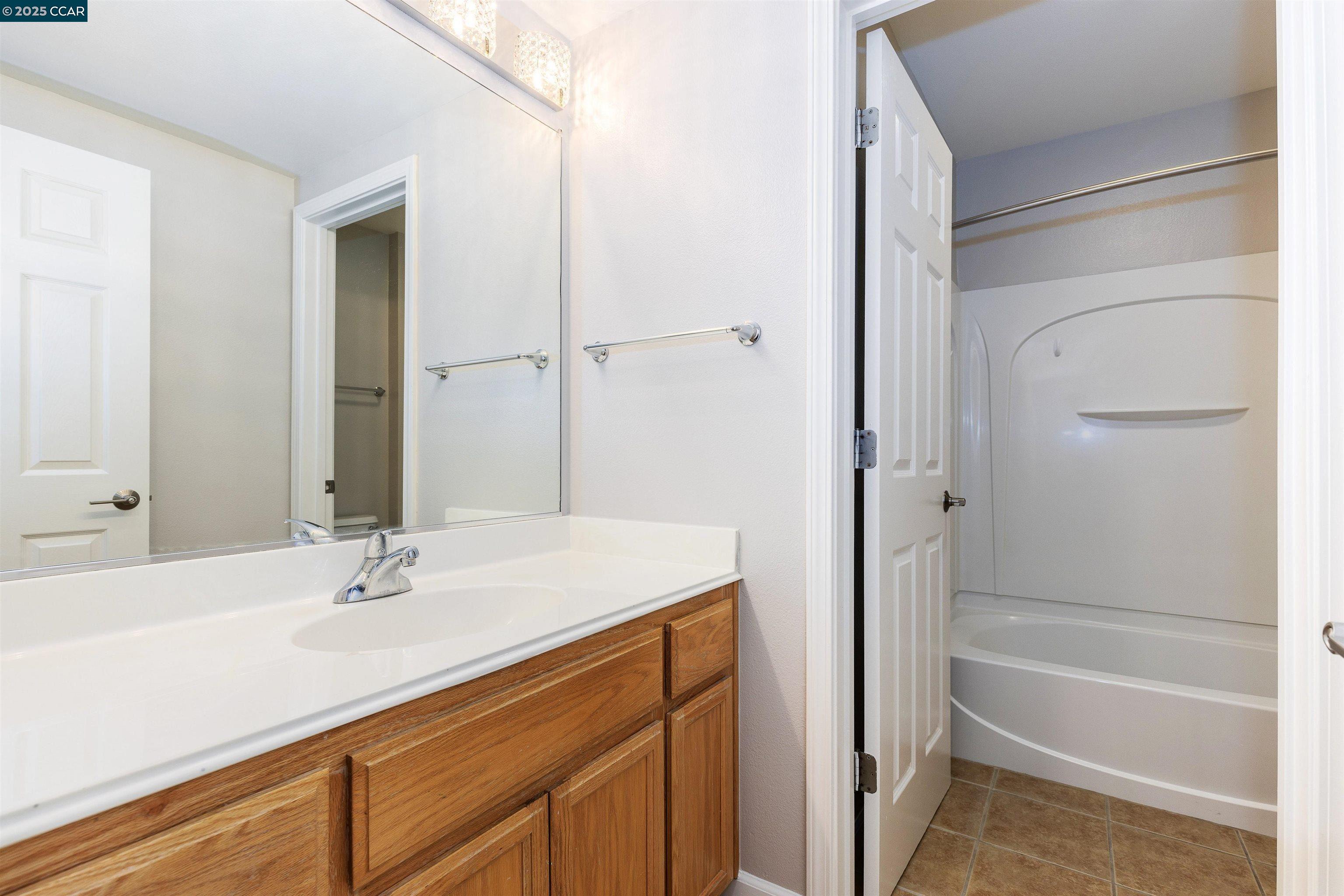2000 Amaryllis San Ramon, CA 94583 - Photo 14 of 20 a bathroom with a sink and a mirror