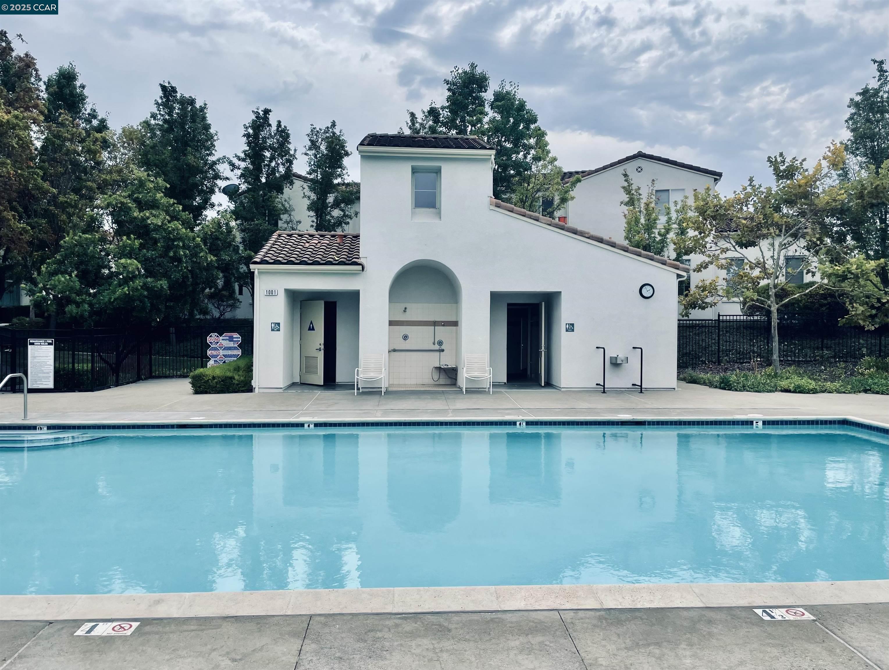 2000 Amaryllis San Ramon, CA 94583 - Photo 19 of 20 a view of a house with a swimming pool and sitting area