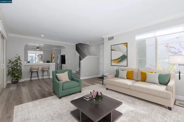 a kitchen with stainless steel appliances granite countertop a sink and stove