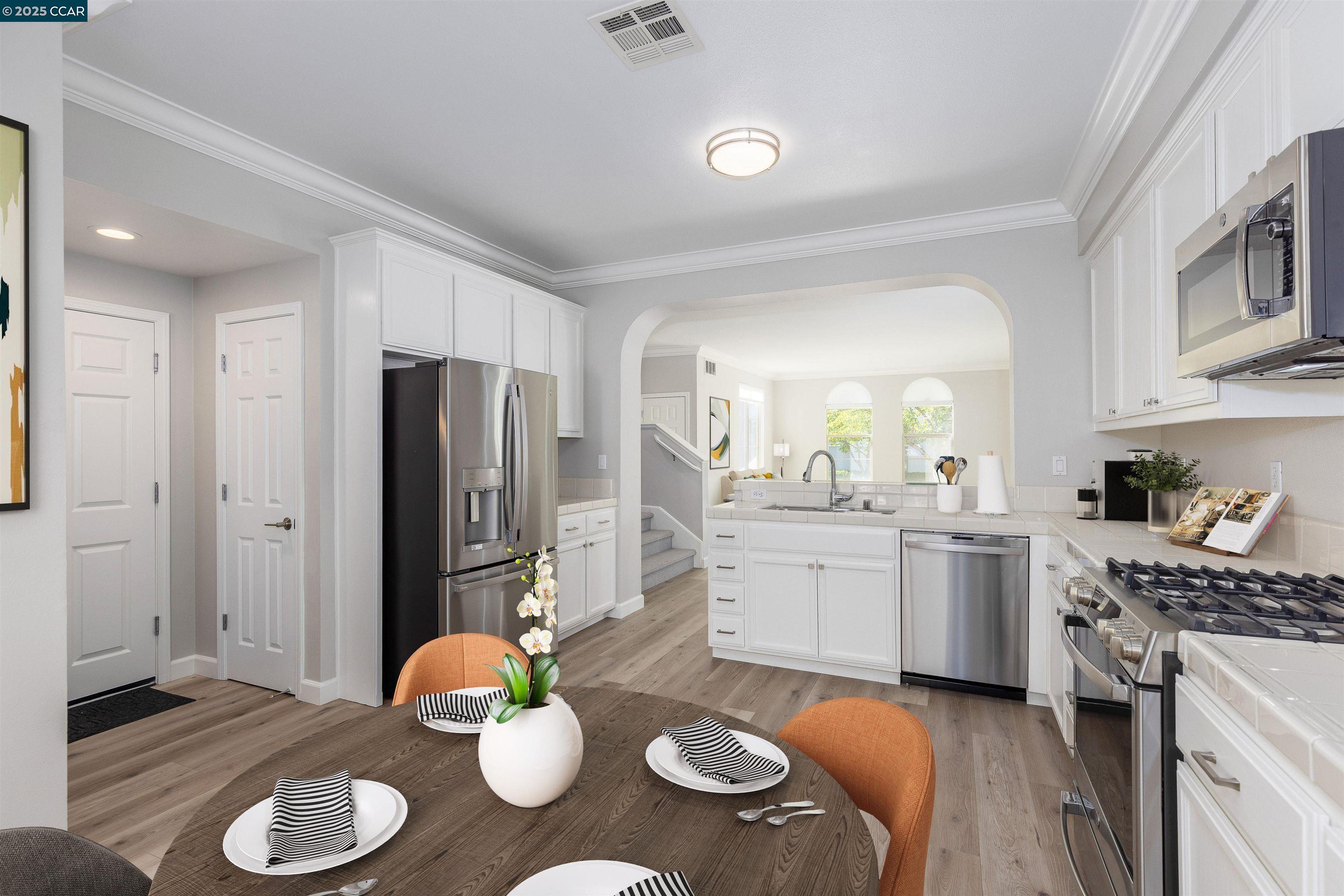 2000 Amaryllis San Ramon, CA 94583 - Photo 10 of 20 a kitchen with stainless steel appliances granite countertop a sink and stove