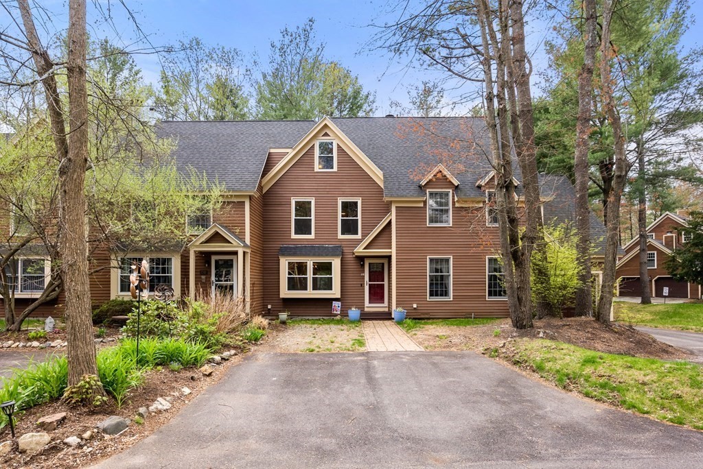 front view of a house with a garden