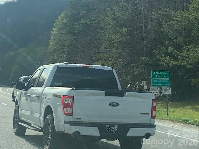 Lot 92 Mountain Summit Road, Unit 92 Zirconia, NC 28790 - Photo 3 of 9 a utility room with dryer and washer