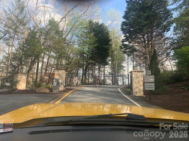 Lot 92 Mountain Summit Road, Unit 92 Zirconia, NC 28790 - Photo 5 of 9 a view of a yard with large trees
