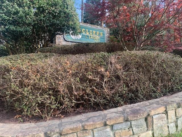 Lot 92 Mountain Summit Road, Unit 92 Zirconia, NC 28790 - Photo 7 of 9 a view of a sign board with large trees