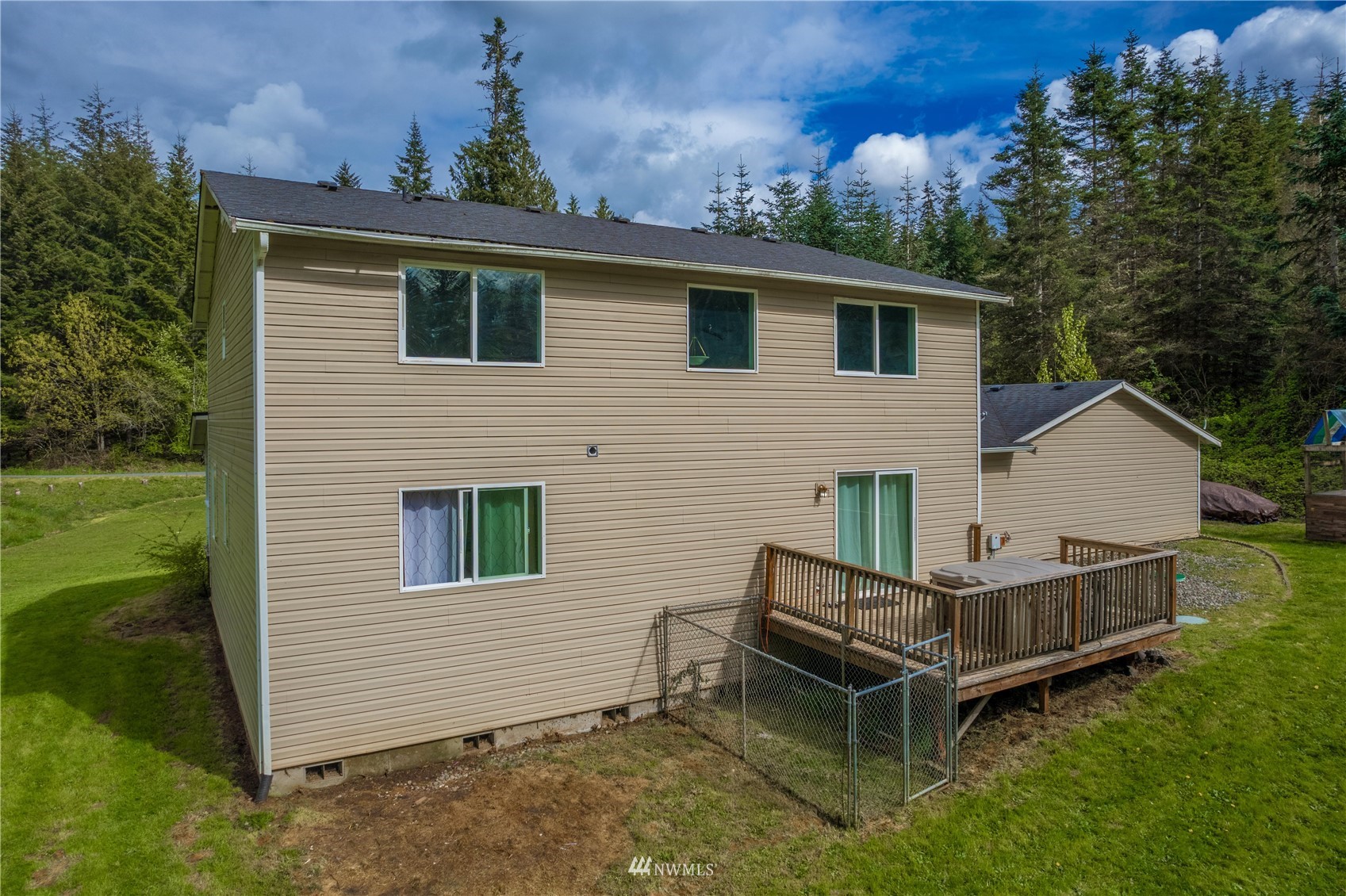 100-10 Cedar Springs Road Chehalis, WA 98532 - Photo 25 of 36 a view of a house with a yard and deck
