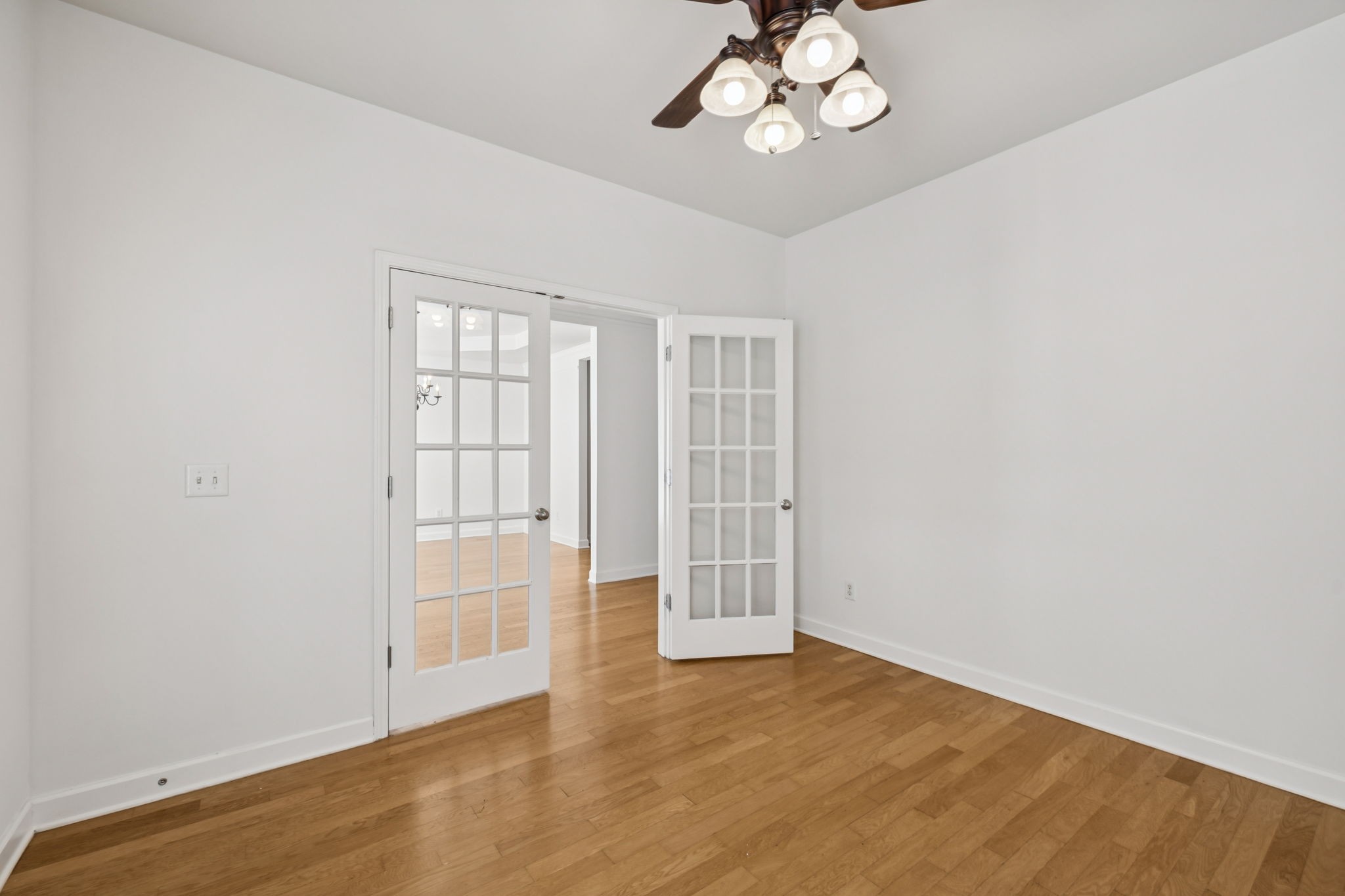 2006 Flocking Drive Spring Hill, TN 37174 - Photo 14 of 86 an empty room with wooden floor and windows