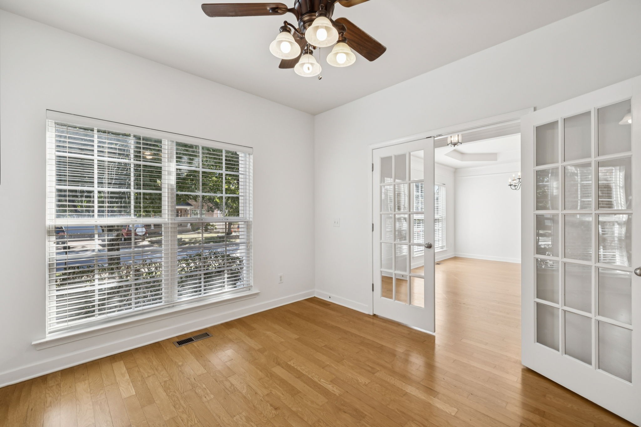 2006 Flocking Drive Spring Hill, TN 37174 - Photo 15 of 86 a view of an empty room with a window and wooden floor
