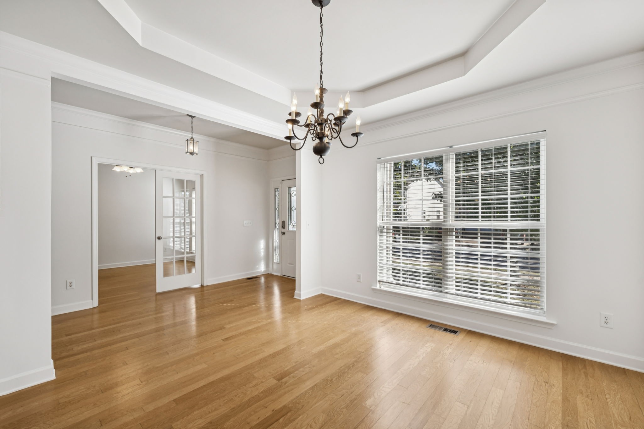 2006 Flocking Drive Spring Hill, TN 37174 - Photo 17 of 86 a view of an empty room with wooden floor and a window