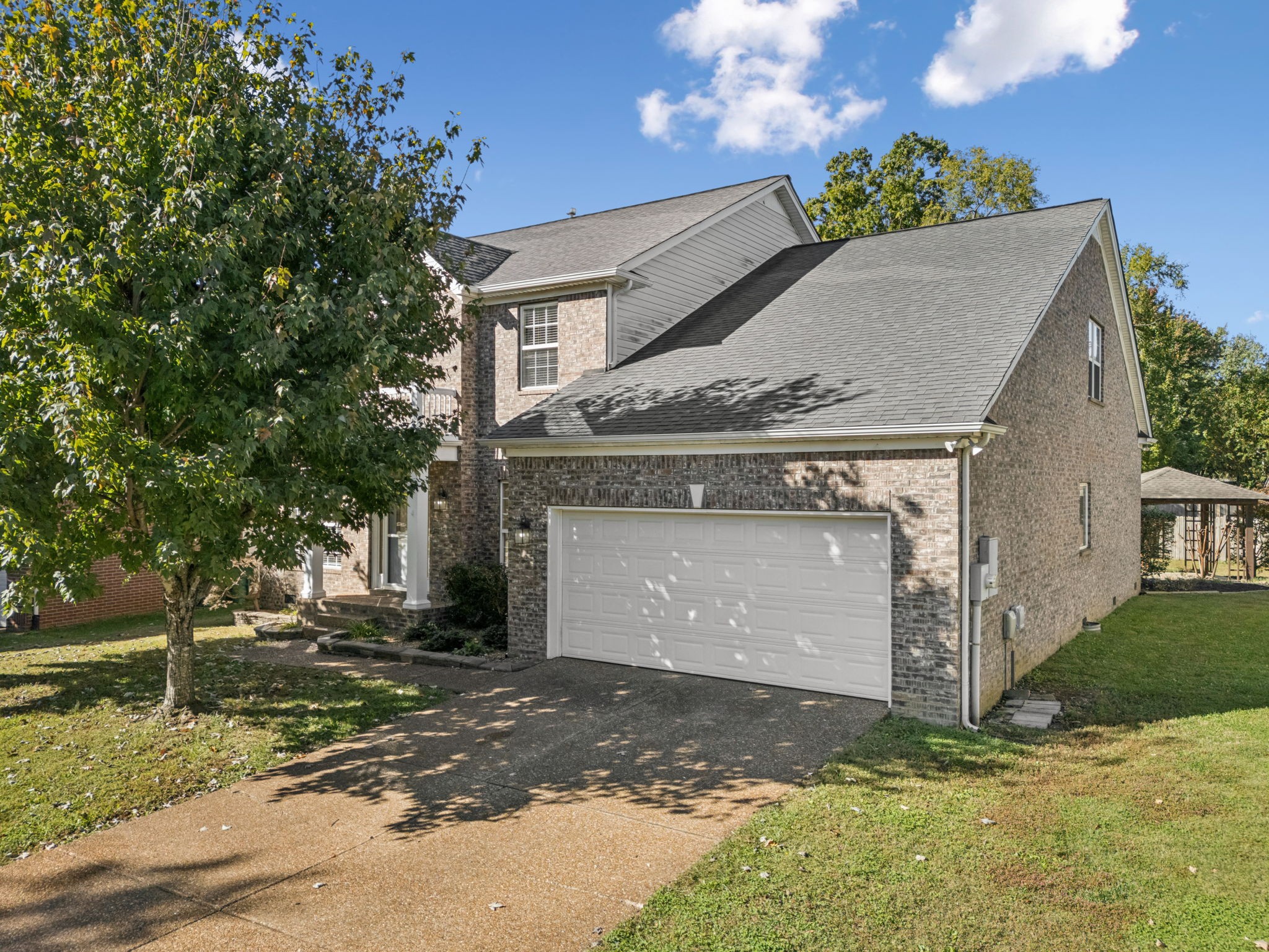 2006 Flocking Drive Spring Hill, TN 37174 - Photo 2 of 86 a view of a house with a yard