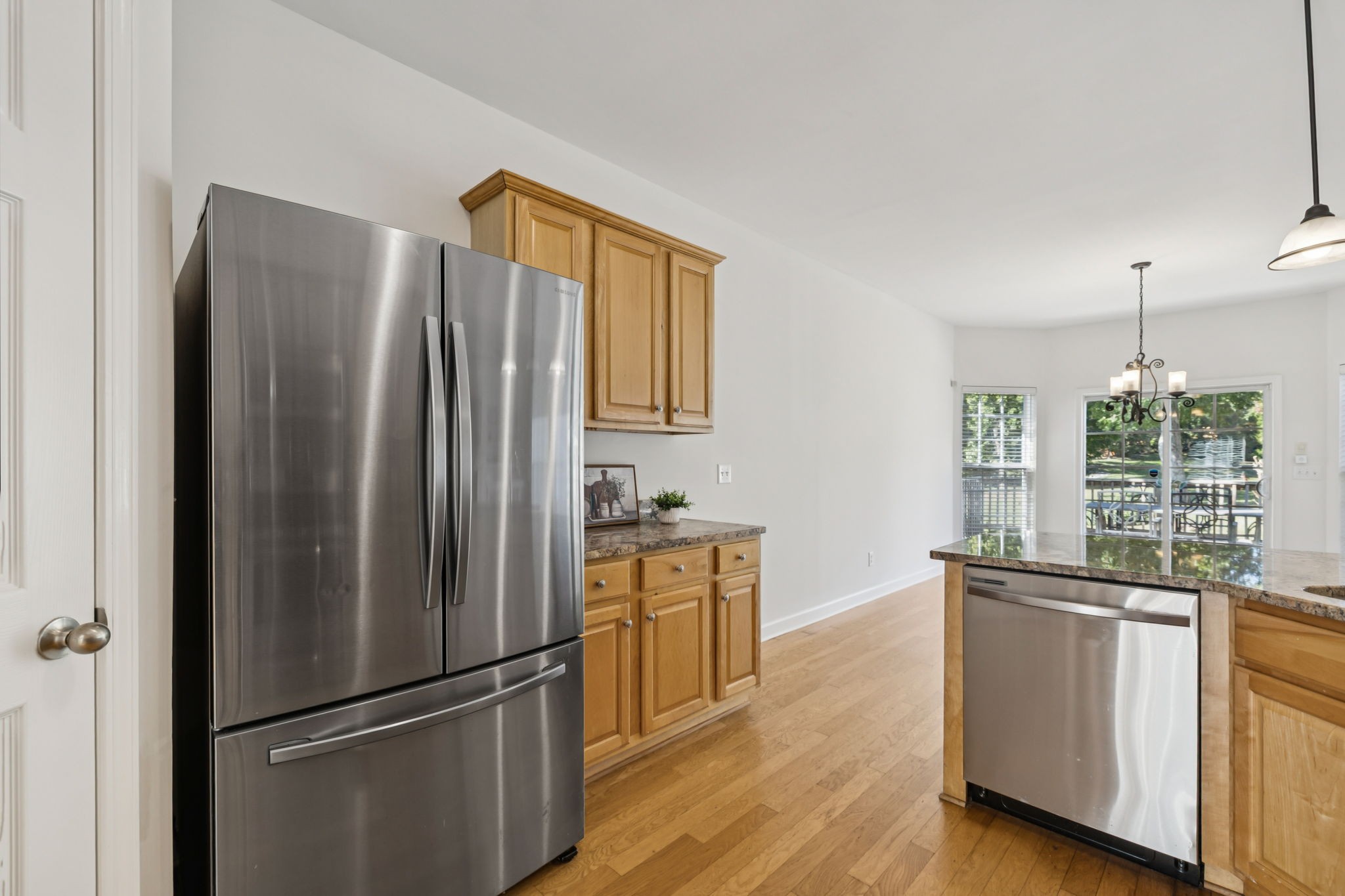 2006 Flocking Drive Spring Hill, TN 37174 - Photo 24 of 86 a kitchen with stainless steel appliances granite countertop a refrigerator and a sink