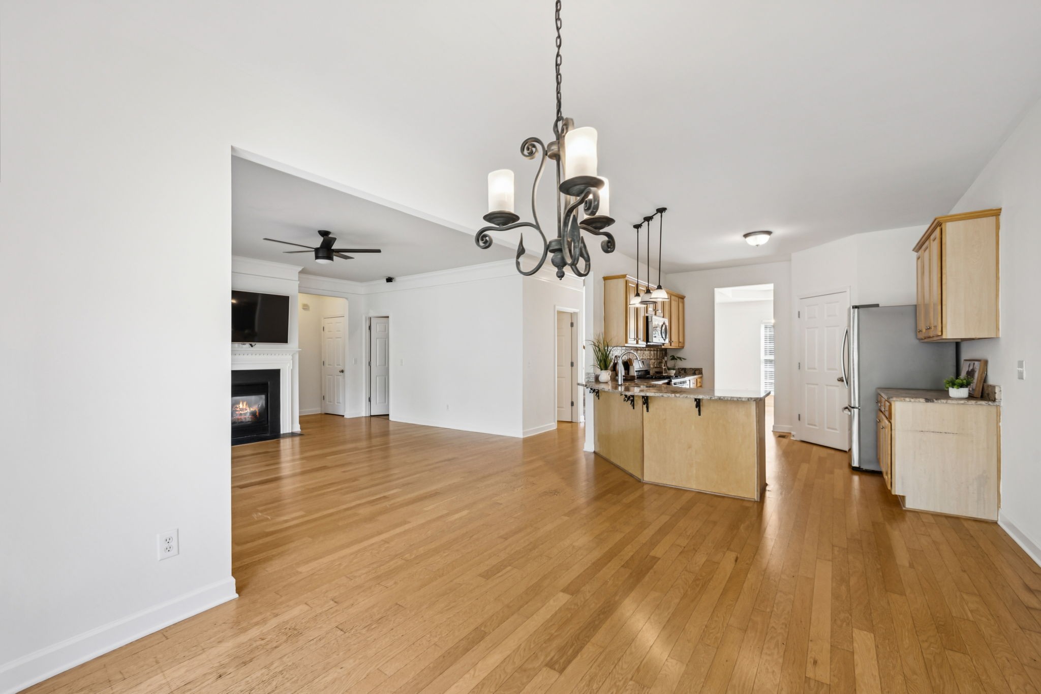 2006 Flocking Drive Spring Hill, TN 37174 - Photo 27 of 86 a view of a living room and kitchen with stainless steel appliances