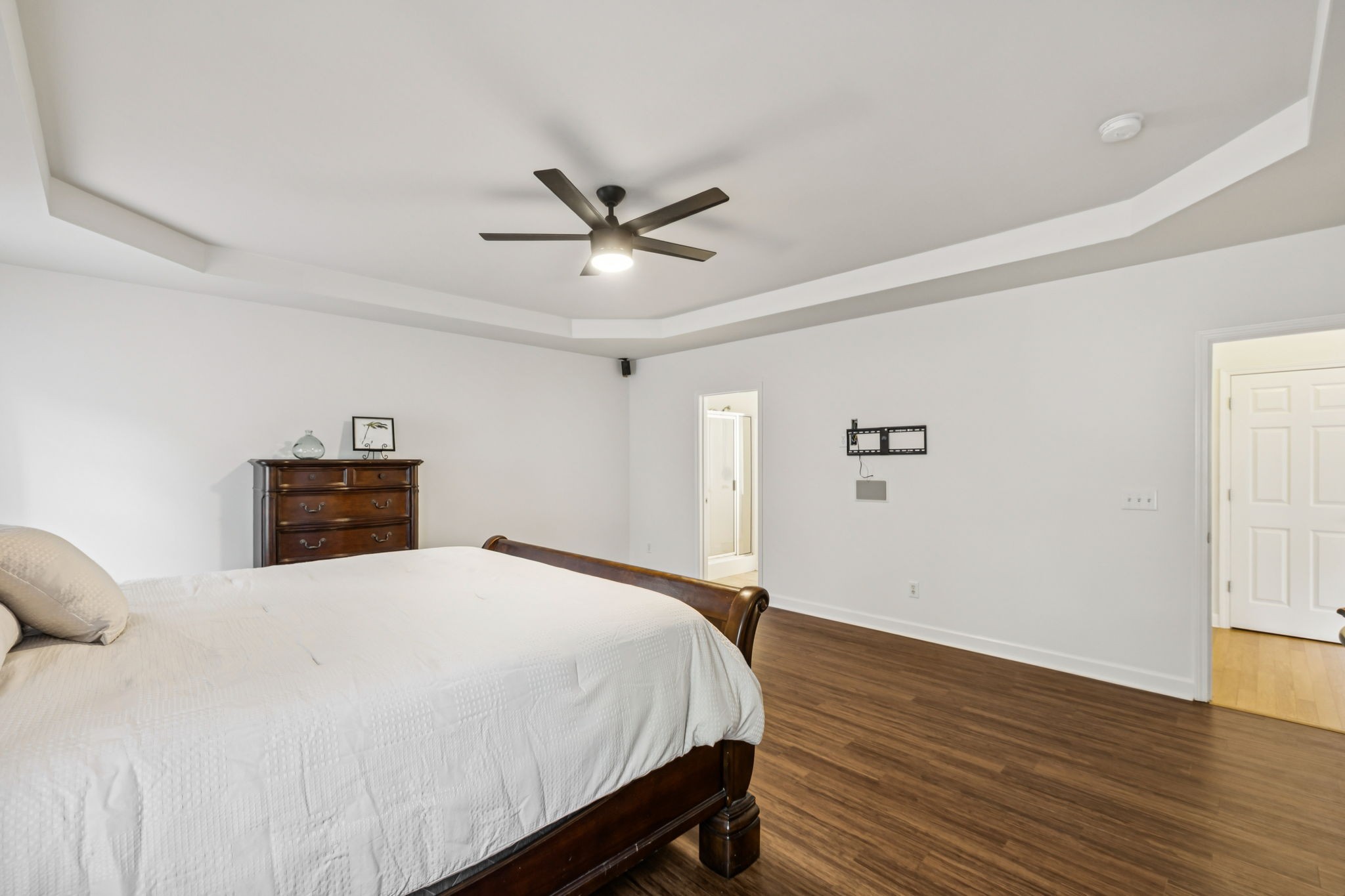 2006 Flocking Drive Spring Hill, TN 37174 - Photo 34 of 86 a spacious bedroom with a bed and a ceiling fan