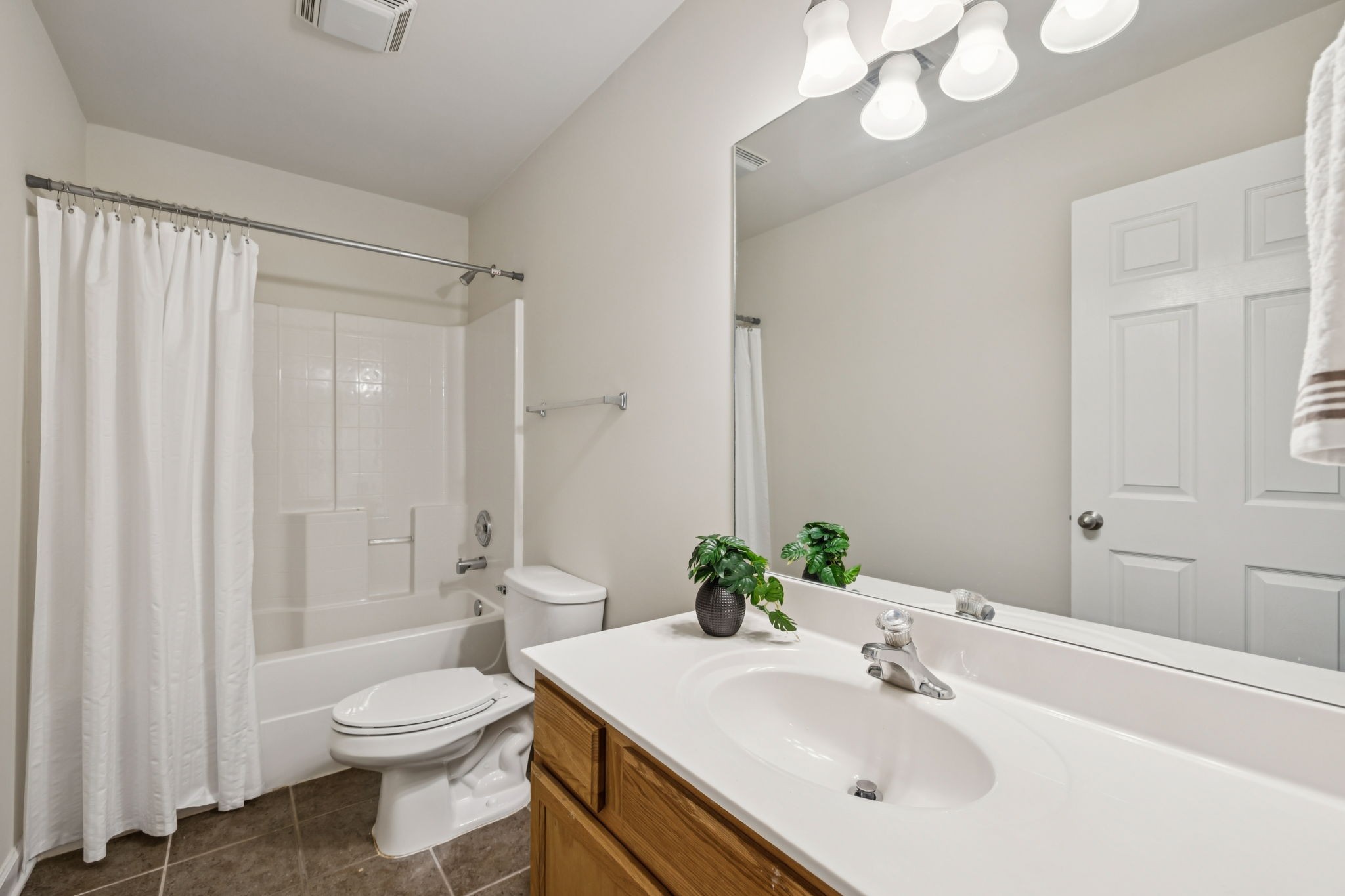 2006 Flocking Drive Spring Hill, TN 37174 - Photo 47 of 86 a bathroom with a sink vanity mirror and toilet