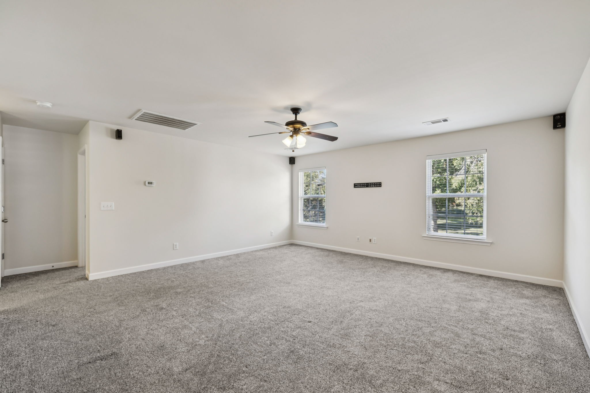 2006 Flocking Drive Spring Hill, TN 37174 - Photo 53 of 86 wooden floor in an empty room with a window