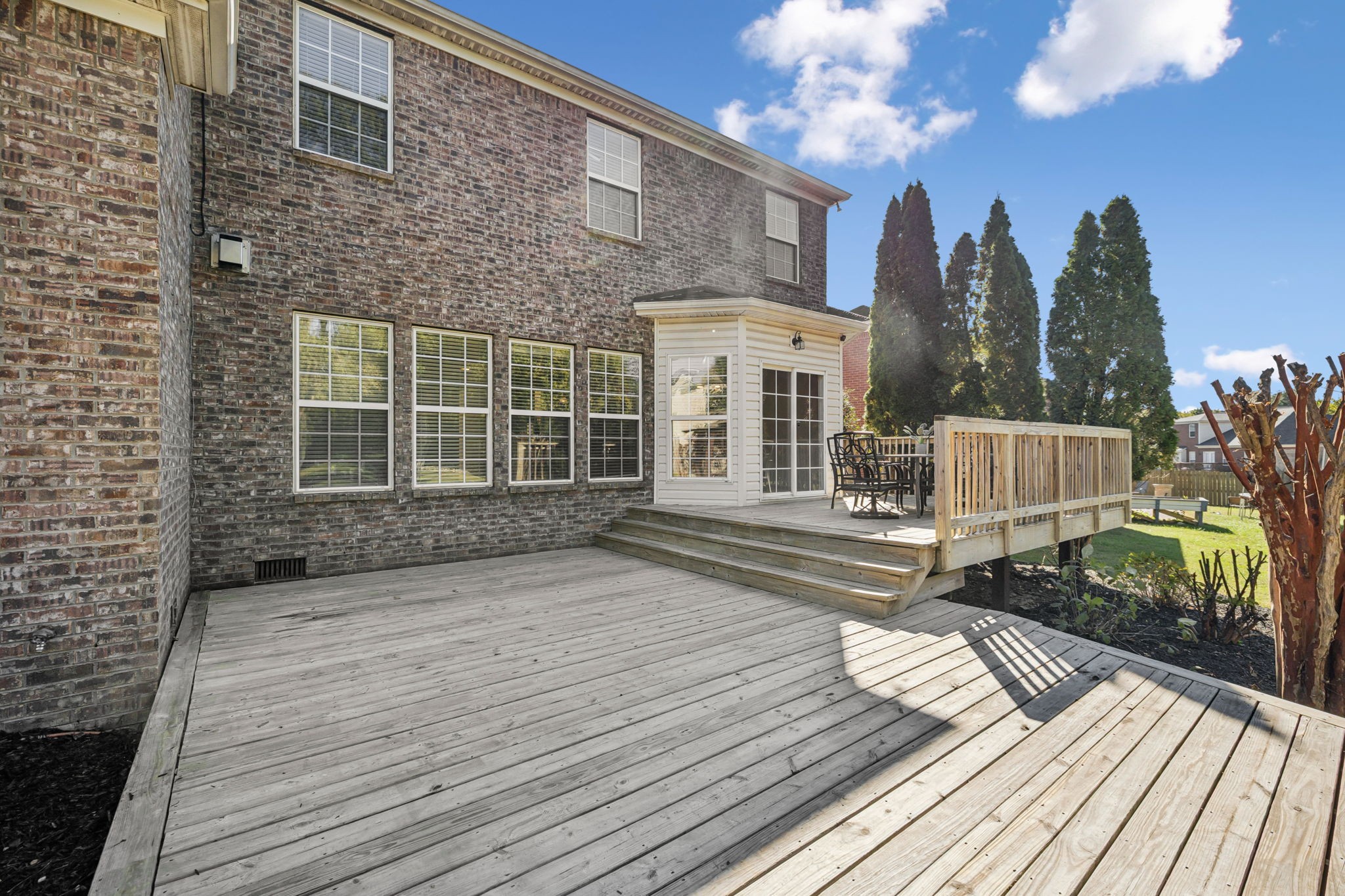 2006 Flocking Drive Spring Hill, TN 37174 - Photo 65 of 86 a view of a house with backyard and wooden floor