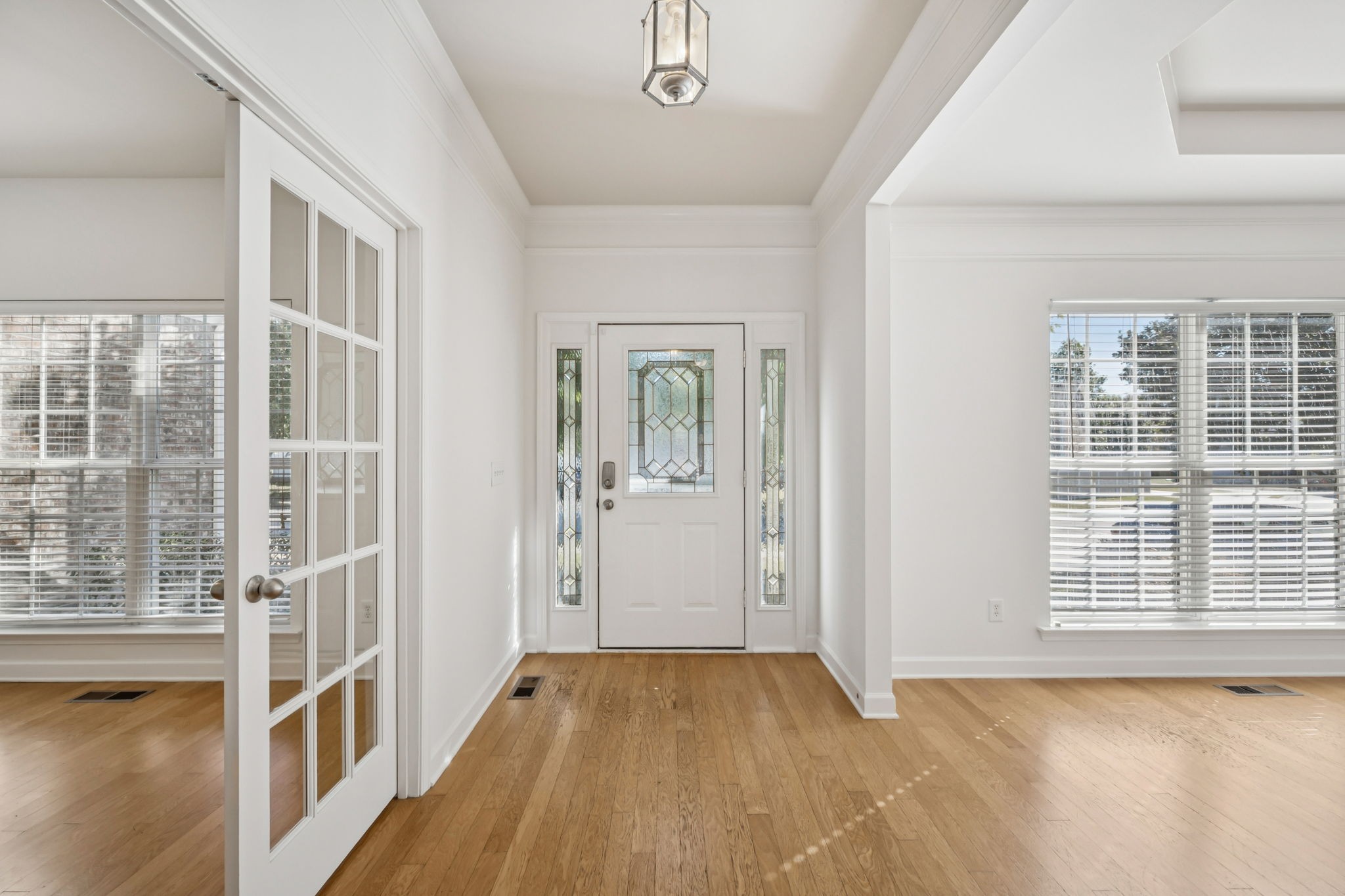 2006 Flocking Drive Spring Hill, TN 37174 - Photo 9 of 86 wooden floor in an empty room with a window