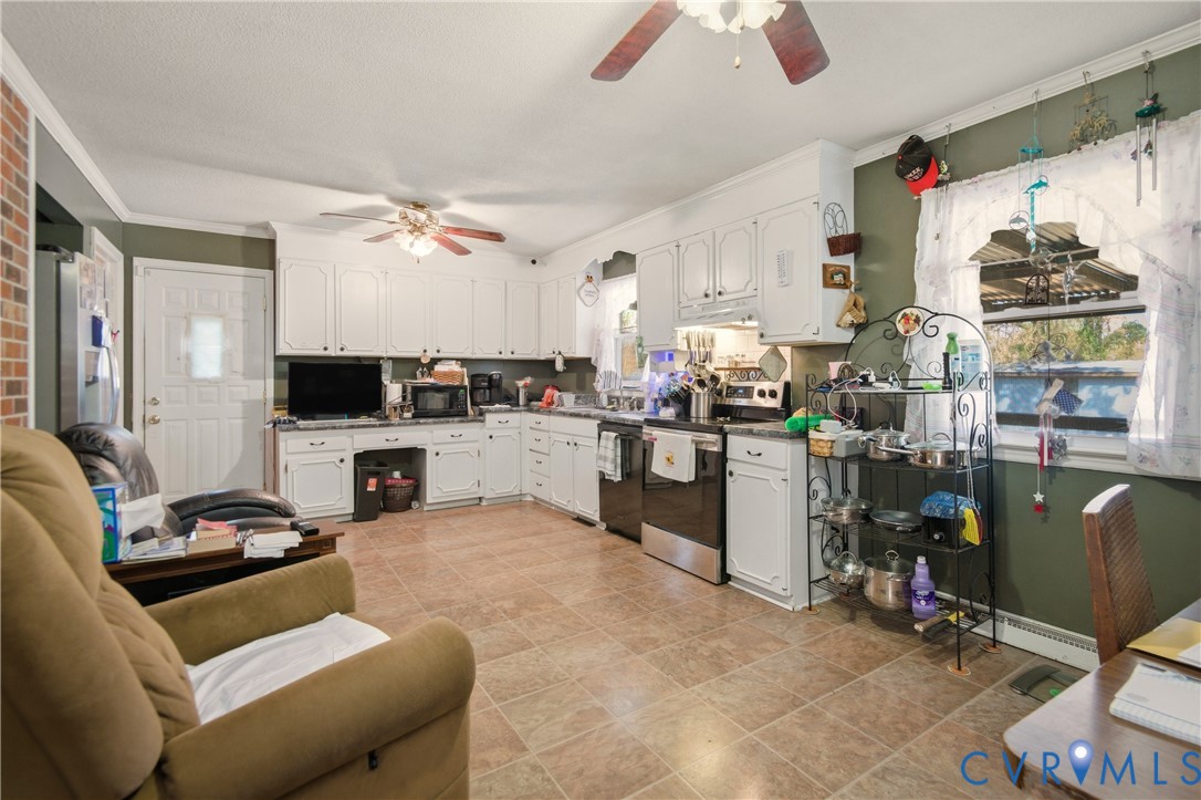 3124 West Hundred Road Chester, VA 23831 - Photo 11 of 28 a living room with furniture and kitchen view