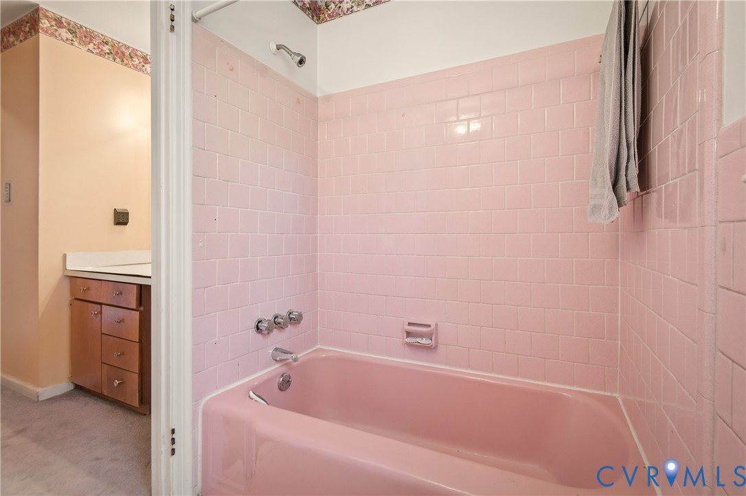 3124 West Hundred Road Chester, VA 23831 - Photo 16 of 28 a bathroom with a bathtub and a shower